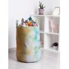 Ambesonne Christmas Laundry Bag, Xmas Town with Buildings and Winter Season Snowing Landscape Illustration, Hamper Basket with Handle Drawstring Closure for Laundromats, 13″ x 19″, Pale Blue Pearl(Pale Orange Seafoam)