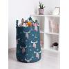 Ambesonne Christmas Laundry Bag, Xmas Town with Buildings and Winter Season Snowing Landscape Illustration, Hamper Basket with Handle Drawstring Closure for Laundromats, 13″ x 19″, Pale Blue Pearl(Petrol Blue Baby Blue)