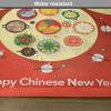 Ambesonne Chinese New Year Place Mats Set of 4, Traditional Family Reunion Dinner Table with Food for The Lunar Festival, Washable Fabric Placemats for Dining Table, Standard Size, Red Yellow
