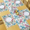 Ambesonne Leaf Table Runner & Placemats, Tropical Jungle Palm Tree Banana Leaves Frangipani Heliconia on Dark Blue Background, Set for Dining Table Decor, Placemat 4 pcs + Runner 16″x72″, Blue Teal(Blue Burgundy)